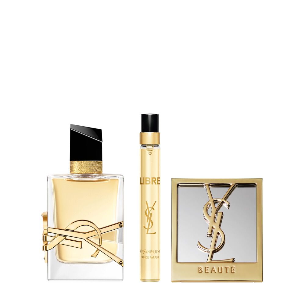 Frasco de Libre Eau de Parfum de 50 ml junto a un formato de viaje de 10 ml y un espejo compacto, sobre fondo blanco.