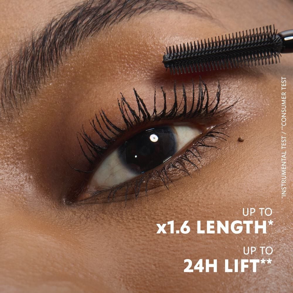 Close-up of YSL Lash Latex Mascara brush with dense micro-bristles.