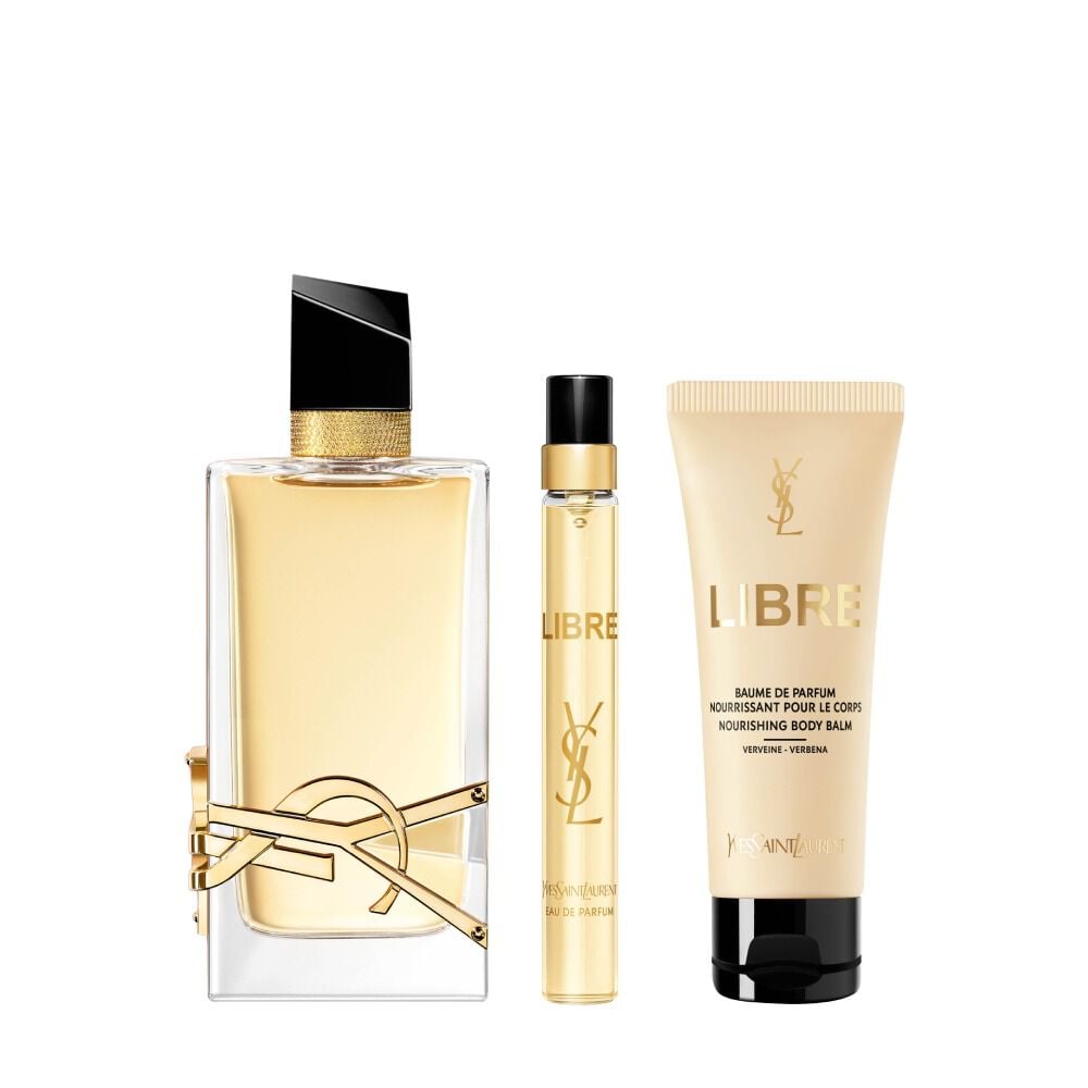 Frasco de Libre Eau de Parfum de 90 ml junto a un spray de viaje de 10 ml y un tubo de locion corporal (50 ml) sobre un fondo blanco.