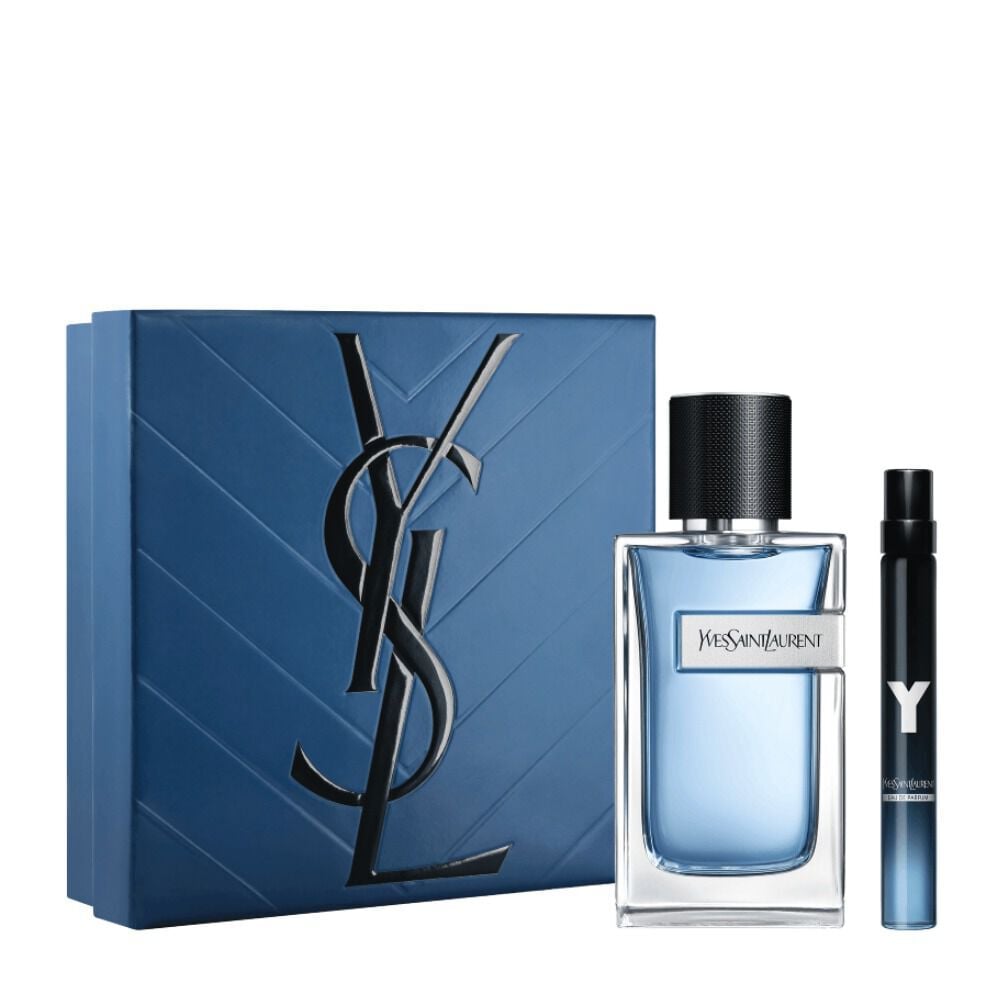 Set de primavera duo YSL Y Eau de Toilette con caja de regalo azul, botella de Y Eau de Toilette de 100 ml y spray de viaje de 10 ml sobre fondo blanco.